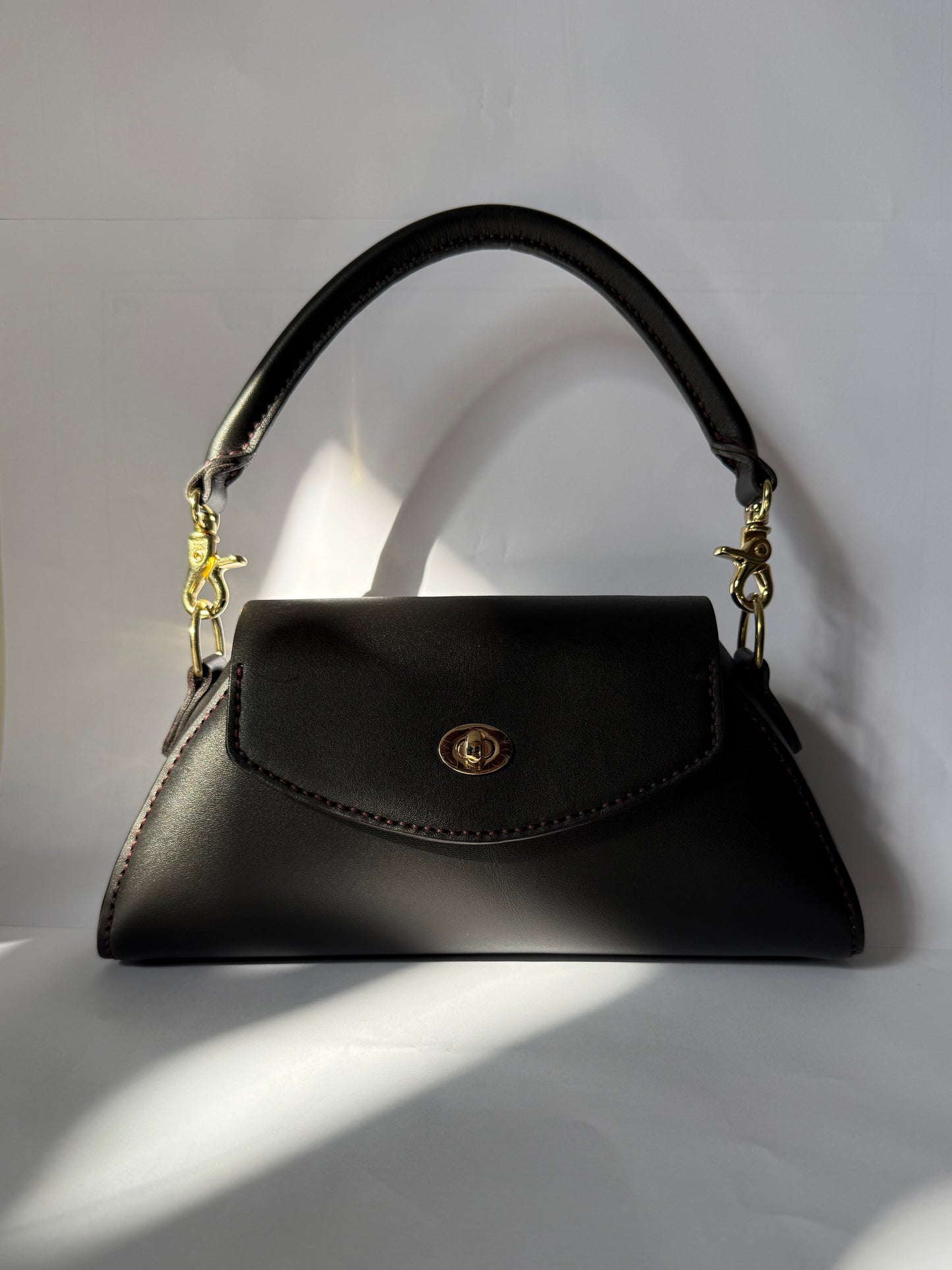 The Satria (black/gold)